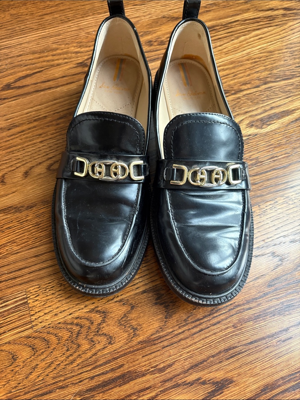 Women’s Black Leather Loafers with Gold Chain Detail
